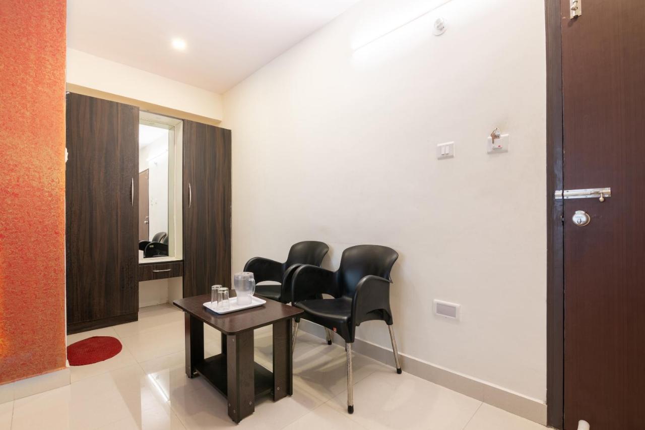 Oyo 13594 Mathrushree Residency Hotel Bangalore Bagian luar foto